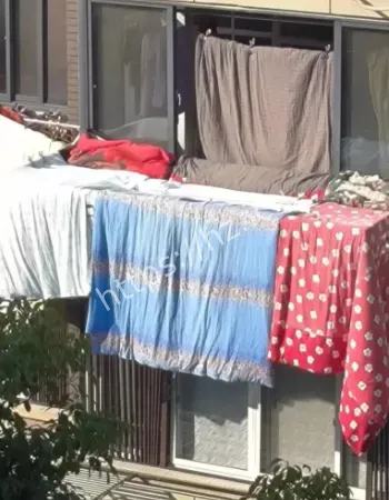 小区不许阳台晒被子